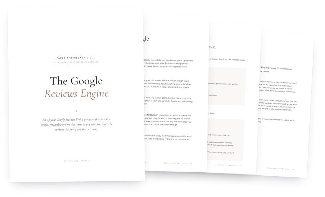 The Google Reviews Engine, the guide shown with its pages fanned behind the cover