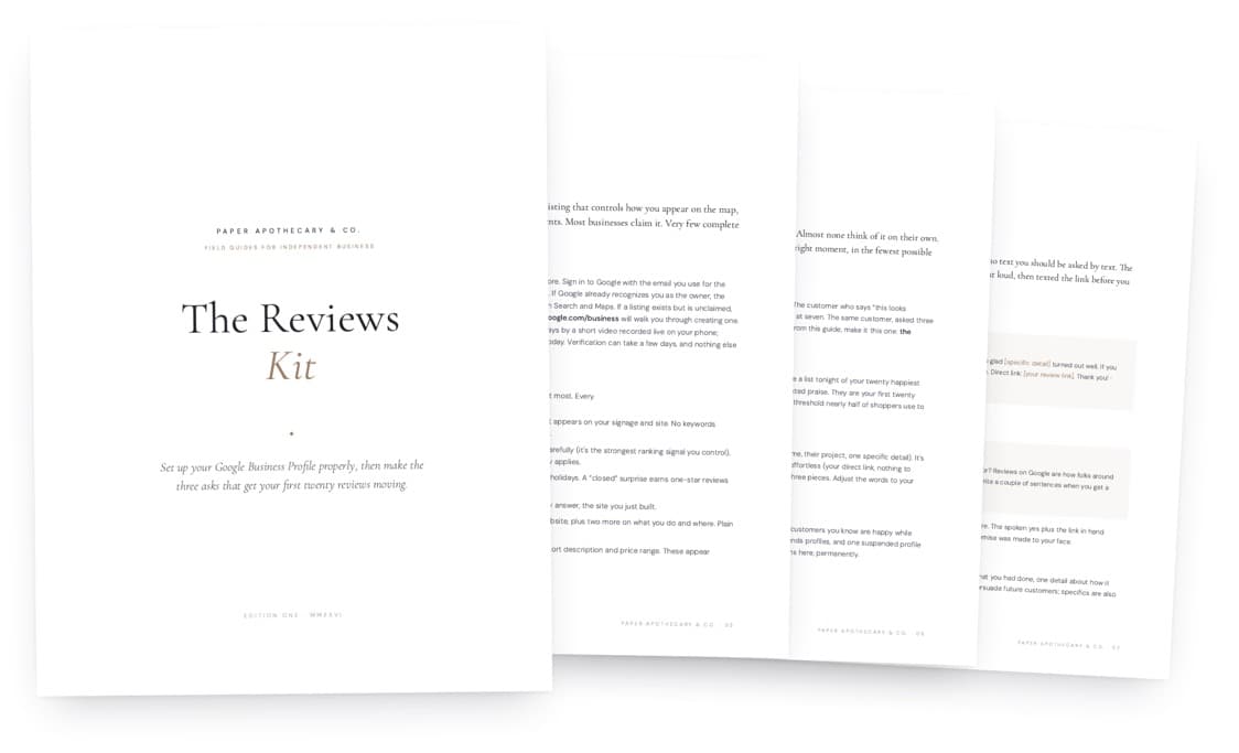 The Reviews Kit, the guide shown with its pages fanned behind the cover